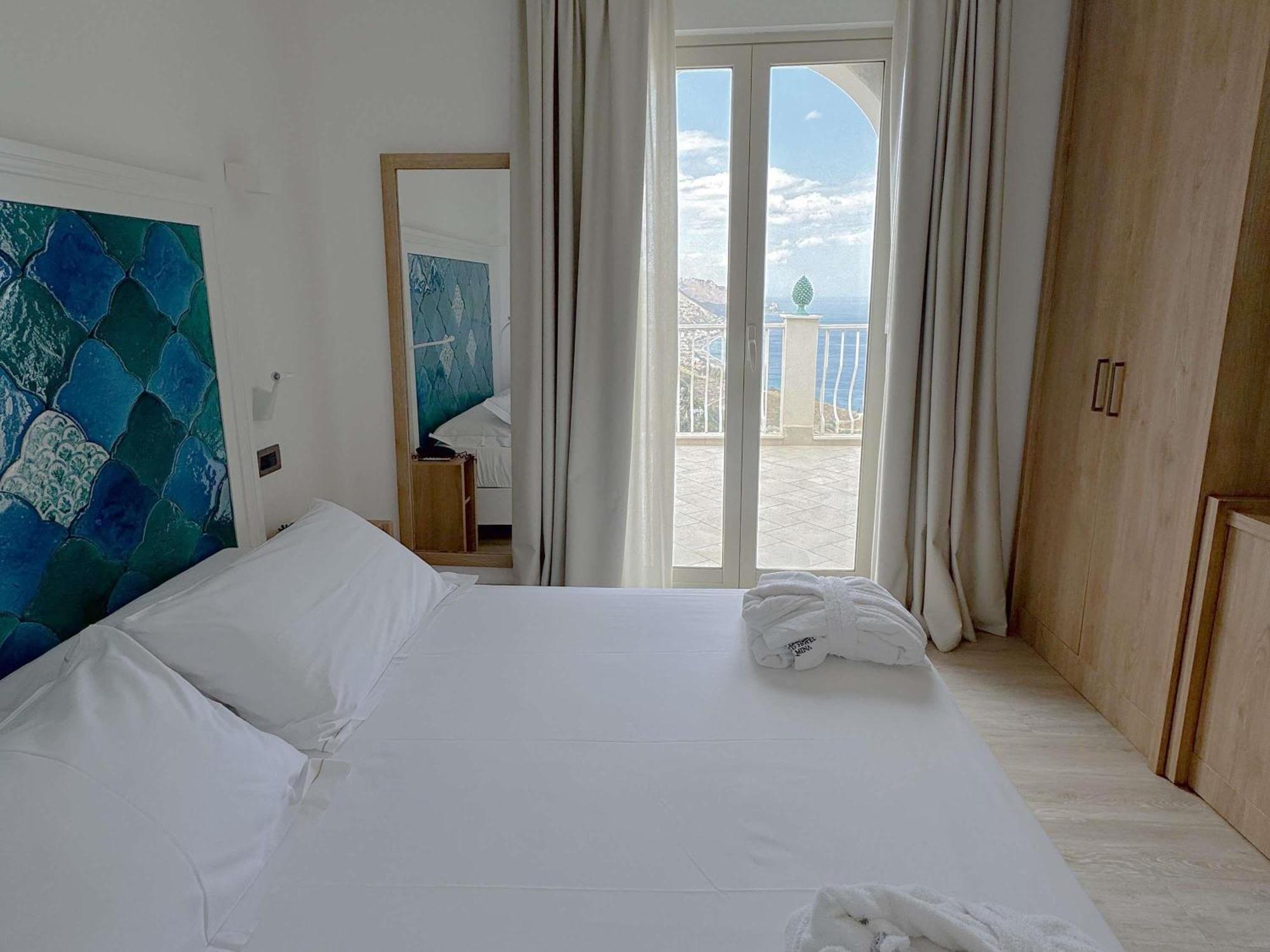 Deluxe-Zimmer mit einem Queensize-Bett und einem Schlafsofa